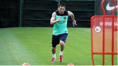 Messi đã trở lại tập luyện bình thường với các đồng đội. Ảnh: Getty Images