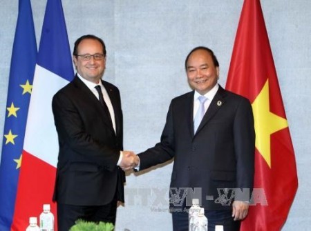 Thủ tướng Nguyễn Xuân Phúc và Tổng thống Pháp Francois Hollande. 